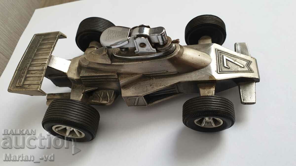 Vintage table lighter in the shape of Formula 1