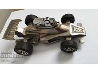 Vintage table lighter in the shape of Formula 1