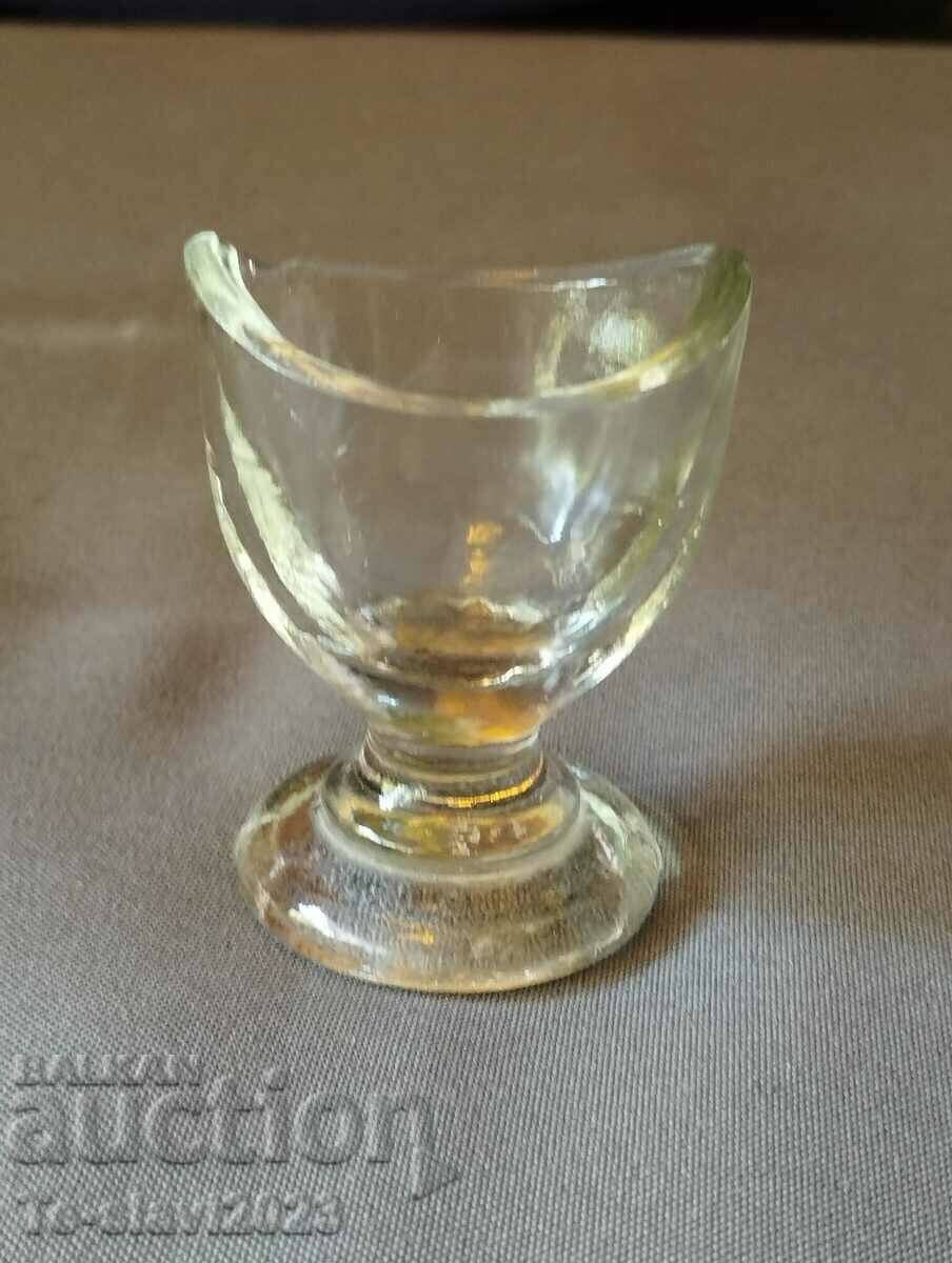 Old medical glass eye wash cup