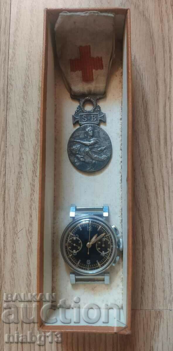 Μετάλλιο και ρολόι χρονογράφου