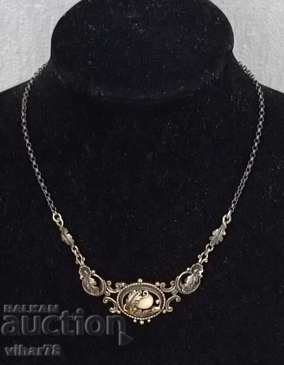 Auction Antique lot - silver with gold elements and deer teeth Auction Antique lot - silver with gold elements and deer teeth