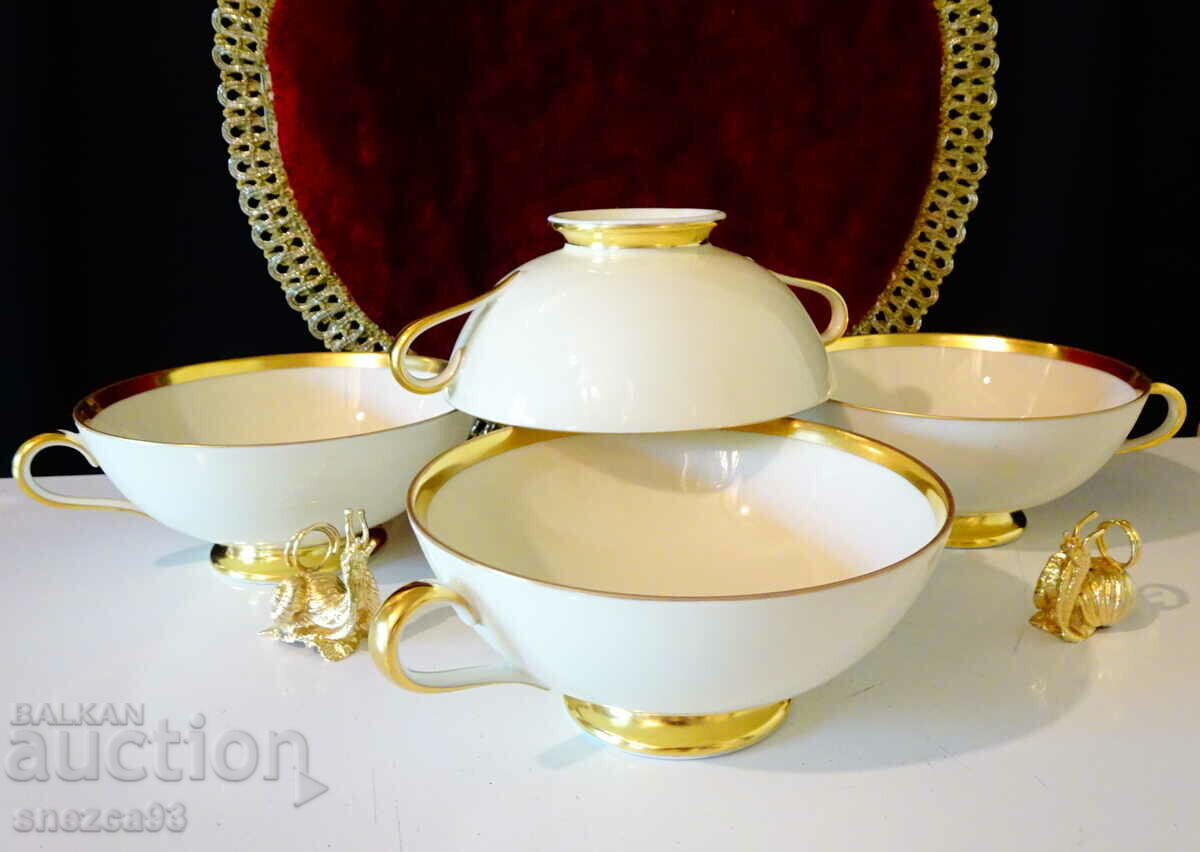 Furstenberg porcelain soup bowls, gold.
