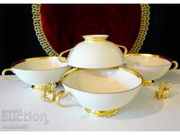 Furstenberg porcelain soup bowls with plates, gold.