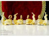 Gilded Snail figures, cutlery holders, service accessories