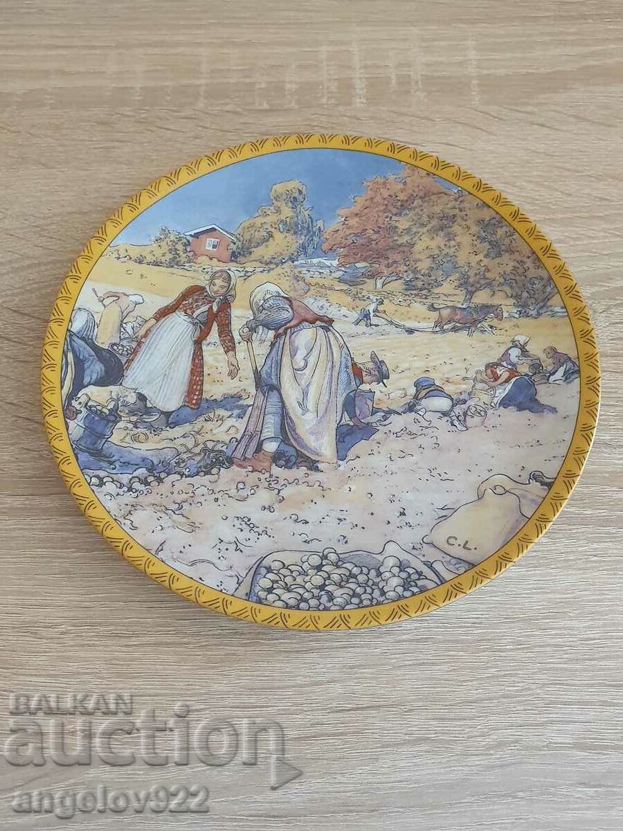 Porcelain plate with a painting by Karl Larsson