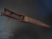 Old forged scissors, marking