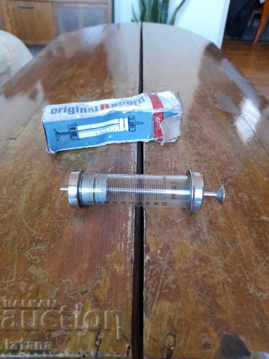 Record old glass syringe with price 22.00 BGN | € 11.25 Record old glass syringe with price 22.00 BGN | € 11.25