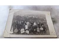 Photo Stob Men, women and children above the village 1938