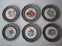 Beautiful, decorative pewter wall plates