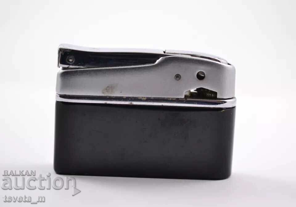 Petrol lighter SUNFLOWER, made in China, 70s XX century with price 10.00 BGN | € 5.11 Petrol lighter SUNFLOWER, made in China, 70s XX century with price 10.00 BGN | € 5.11