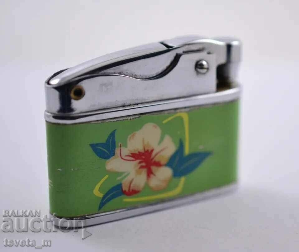 Petrol lighter SUNFLOWER, made in China, 70s XX century with price 10.00 BGN | € 5.11 Petrol lighter SUNFLOWER, made in China, 70s XX century with price 10.00 BGN | € 5.11