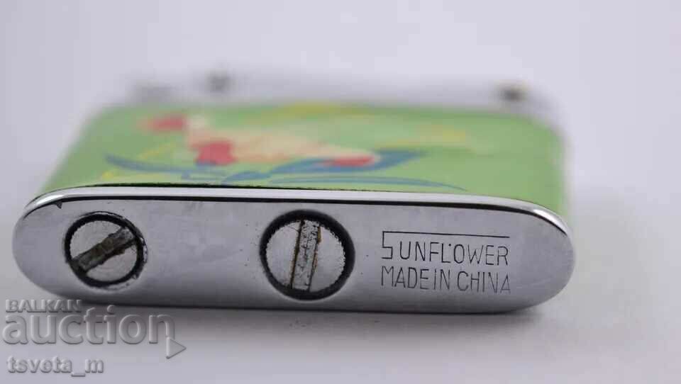Auction Petrol lighter SUNFLOWER, made in China, 70s XX century Auction Petrol lighter SUNFLOWER, made in China, 70s XX century