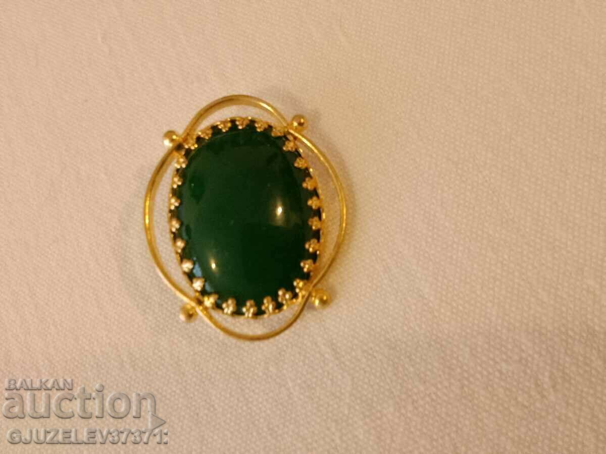 Delivery of Brass brooch with a dark green variety of agate Delivery of Brass brooch with a dark green variety of agate