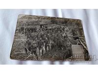 Photo Officers and soldiers in front of dugouts on the P.S.V. front