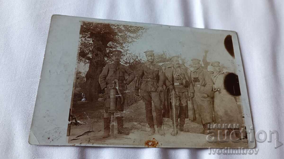 Photo Five officers of the P.S.V. front