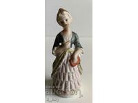 PORCELAIN STATUETTE FIGURE OF A HEALTHY WOMAN