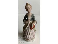 PORCELAIN STATUETTE FIGURE OF A HEALTHY WOMAN