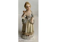 PORCELAIN STATUETTE FIGURE OF A HEALTHY WOMAN