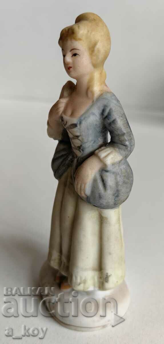 Delivery of PORCELAIN STATUETTE FIGURE OF A HEALTHY WOMAN Delivery of PORCELAIN STATUETTE FIGURE OF A HEALTHY WOMAN