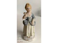 PORCELAIN STATUETTE FIGURE OF A HEALTHY WOMAN