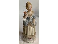 PORCELAIN STATUETTE FIGURE OF A HEALTHY WOMAN