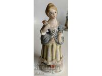 PORCELAIN STATUETTE FIGURE OF A HEALTHY WOMAN