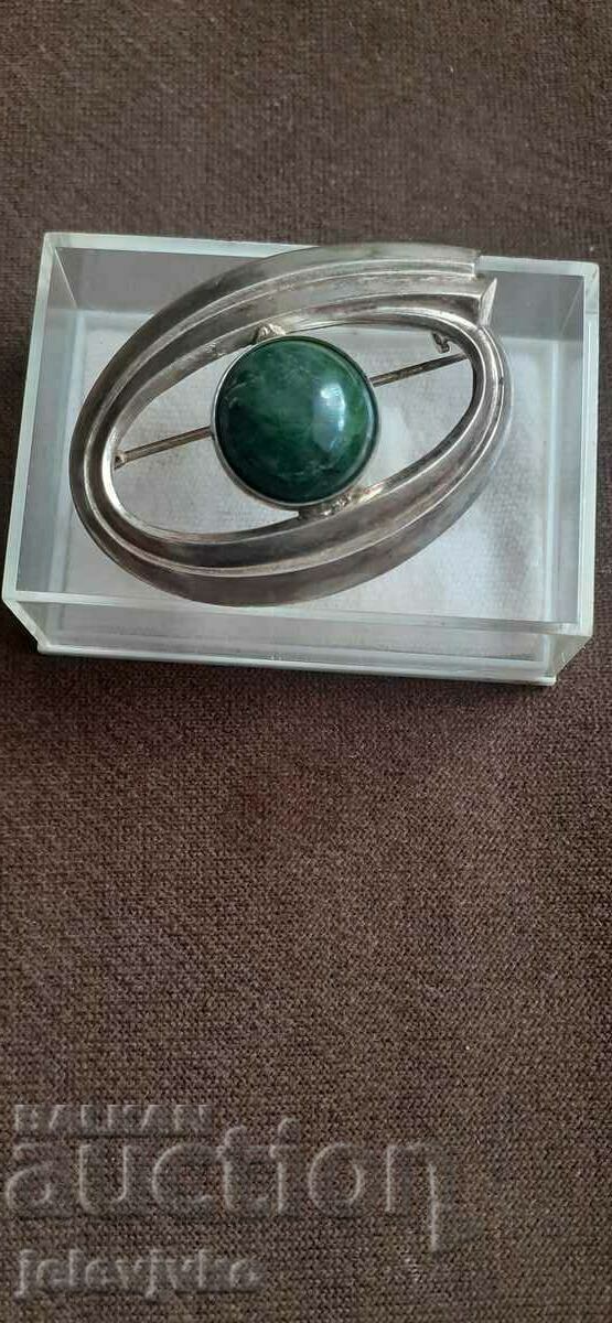 Green stone brooch