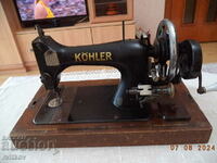 I am selling an old WORKING German KOHLER sewing machine