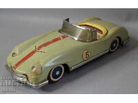 Old metal sheet metal toy sports car model