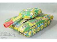 Old metal sheet metal toy tank model