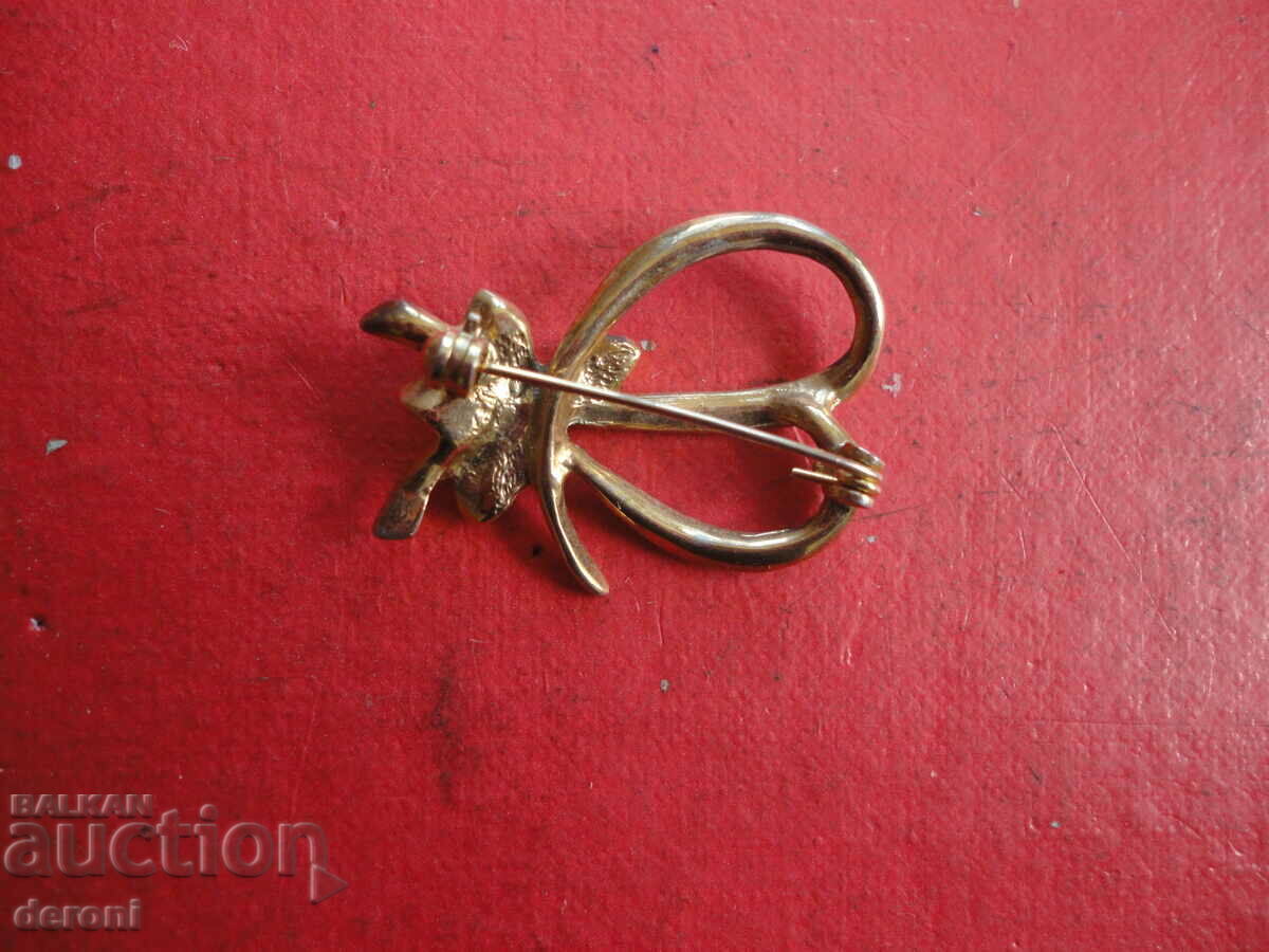 Auction  Gold-plated brooch with stones 41
