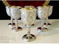 Silver-plated cups, vines, grapes, gilding.