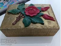 Wooden box with embossed flower......