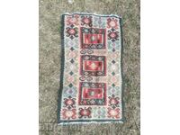 a small cypress rug