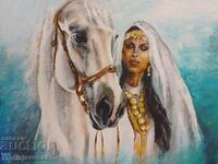 A woman with a white horse