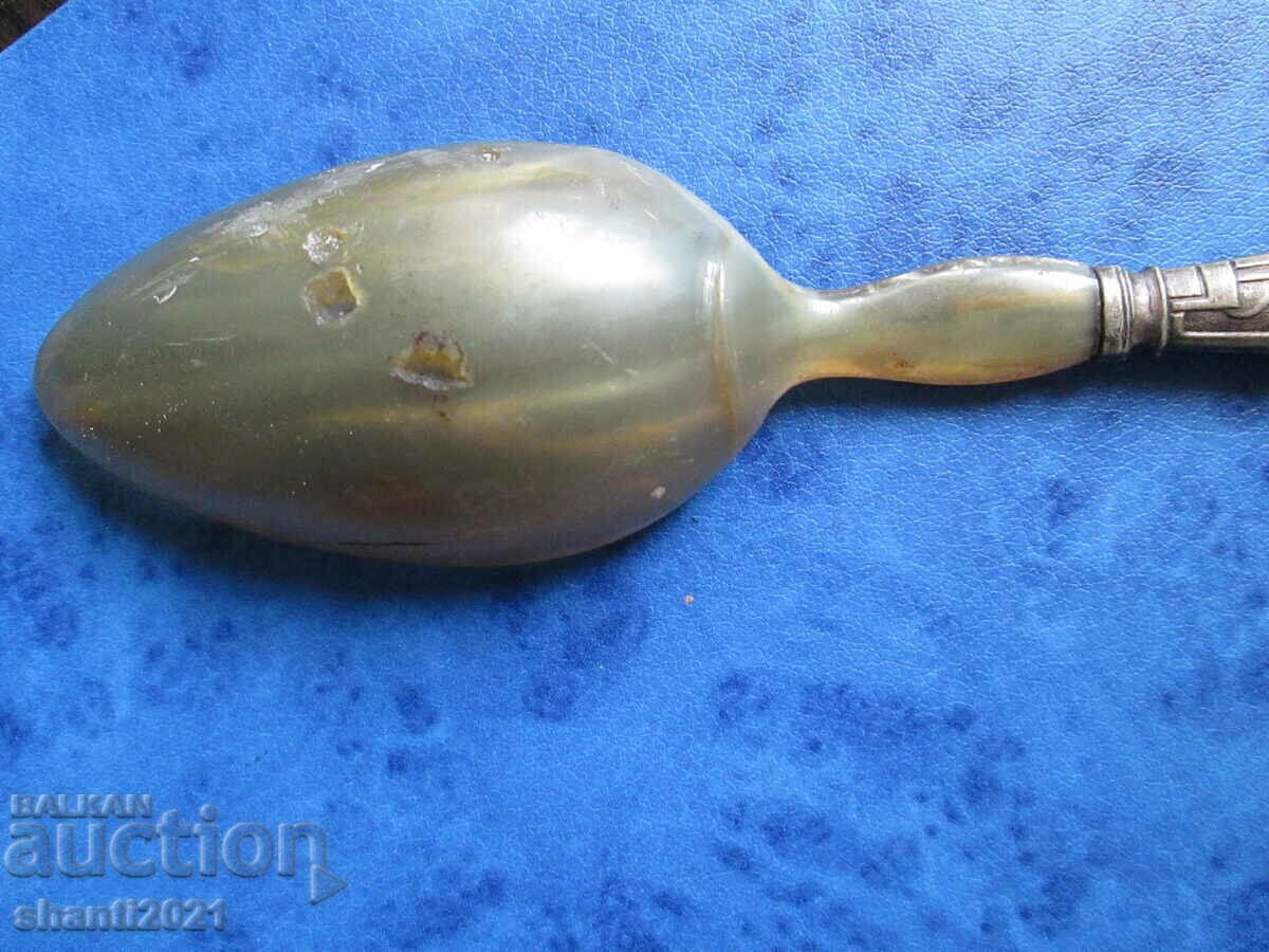 Delivery of A very old horn spoon