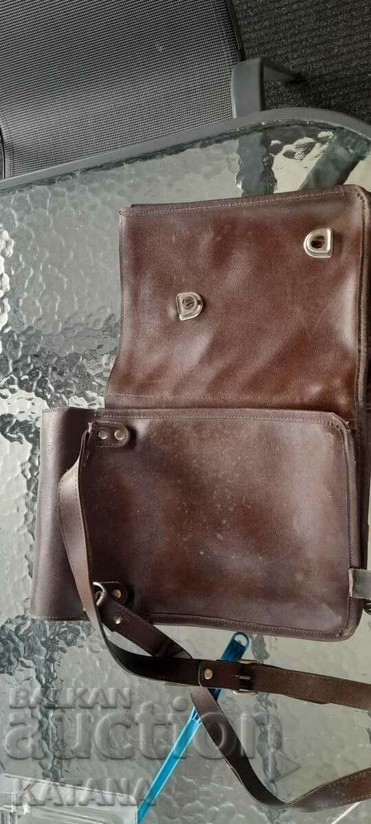 Delivery of Officer's leather bag with initials