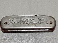 Old harmonica, musical instrument Poland