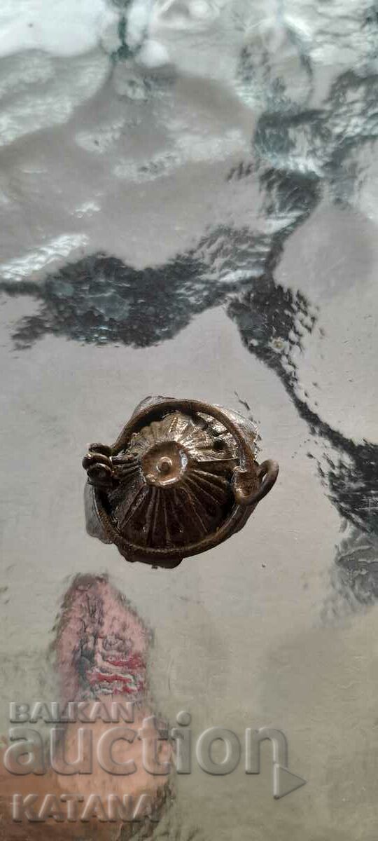 Auction  Old brooch with bells