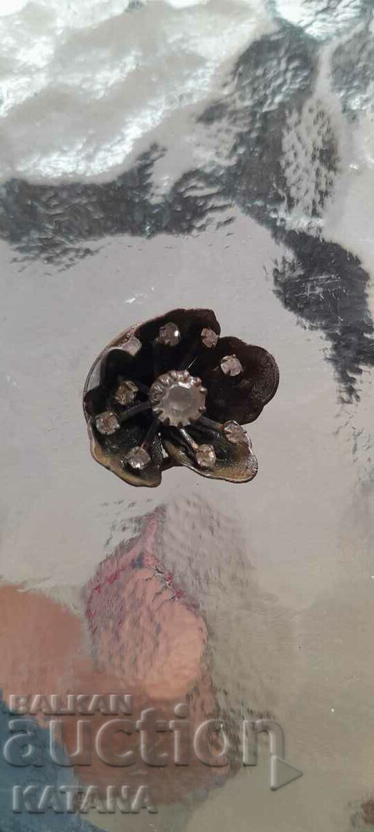 Old brooch with bells