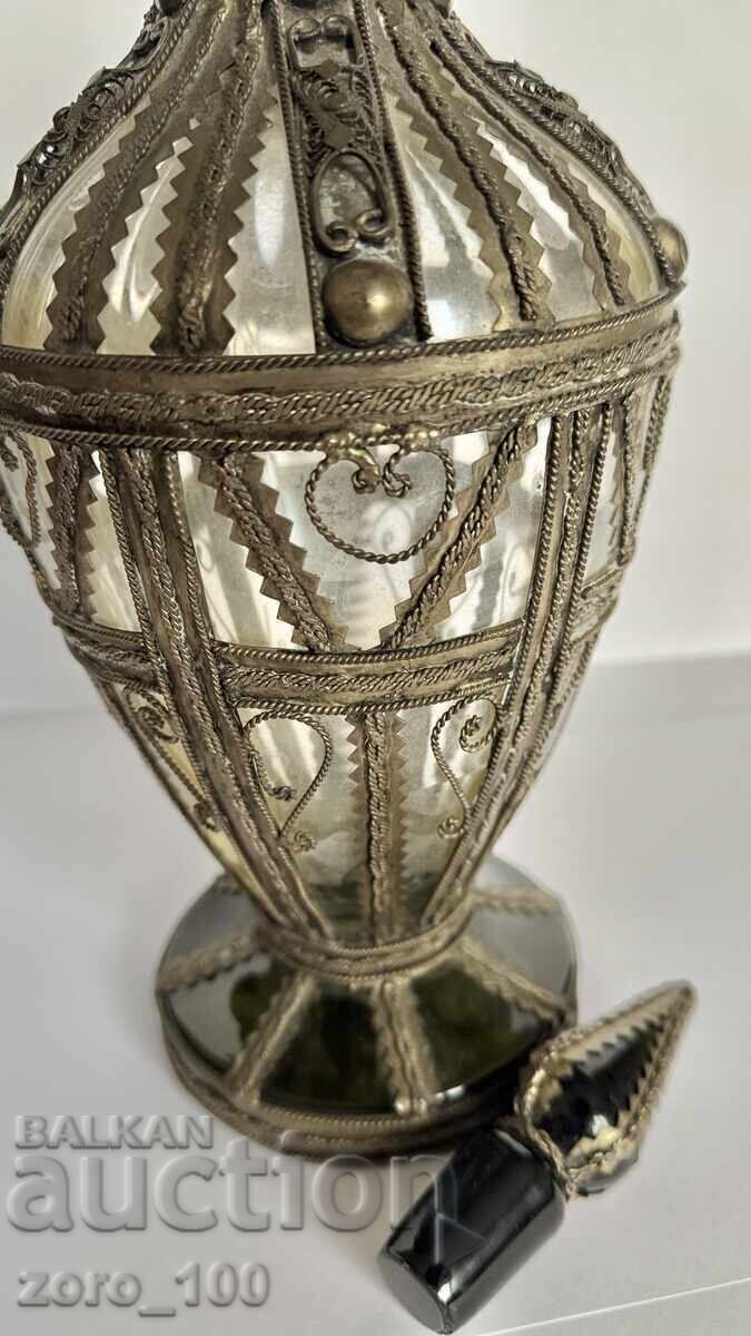 Delivery of Vintage beverage bottle with fittings