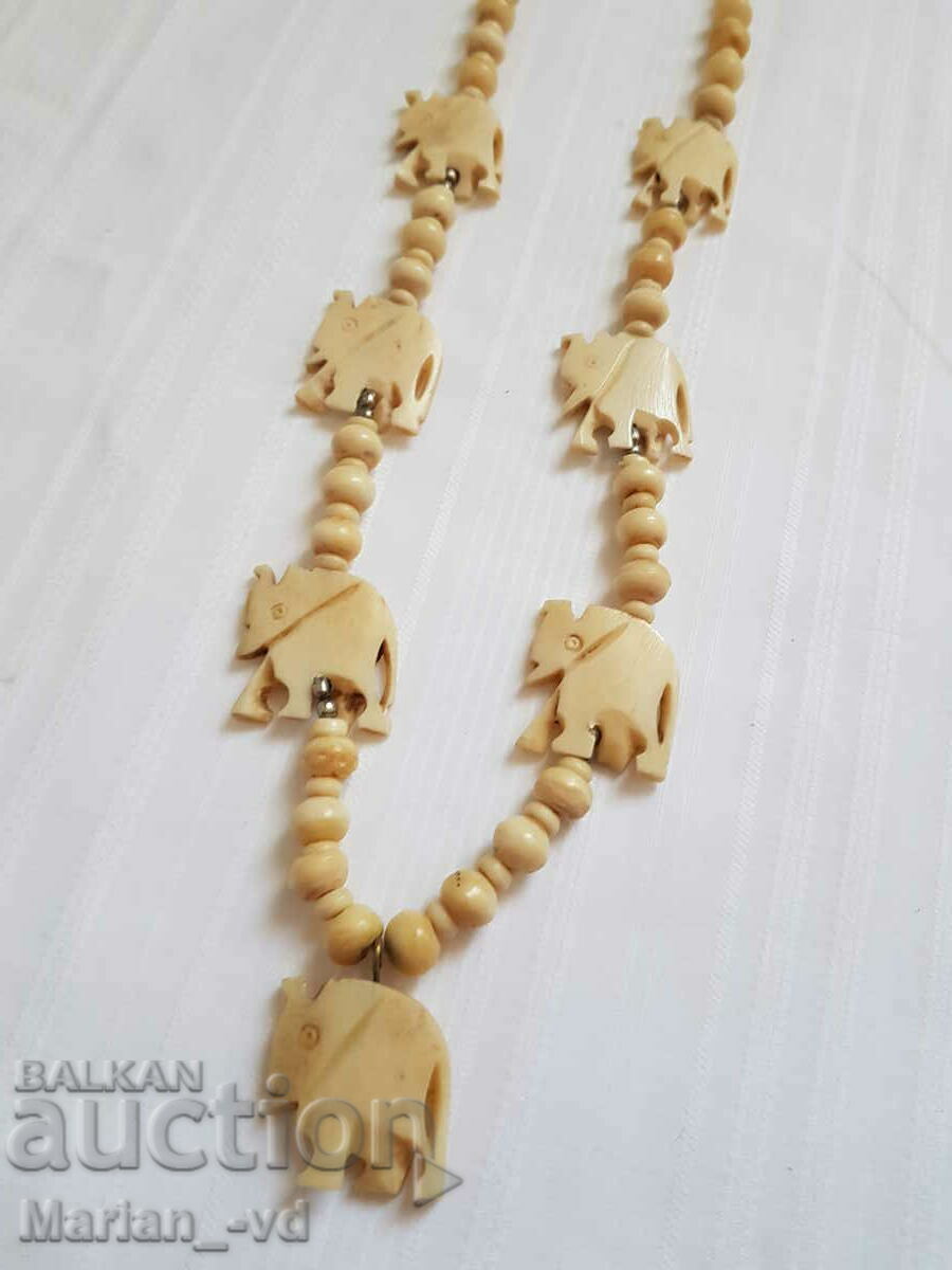 Auction  Necklace bone, elephant, pendant, figurine