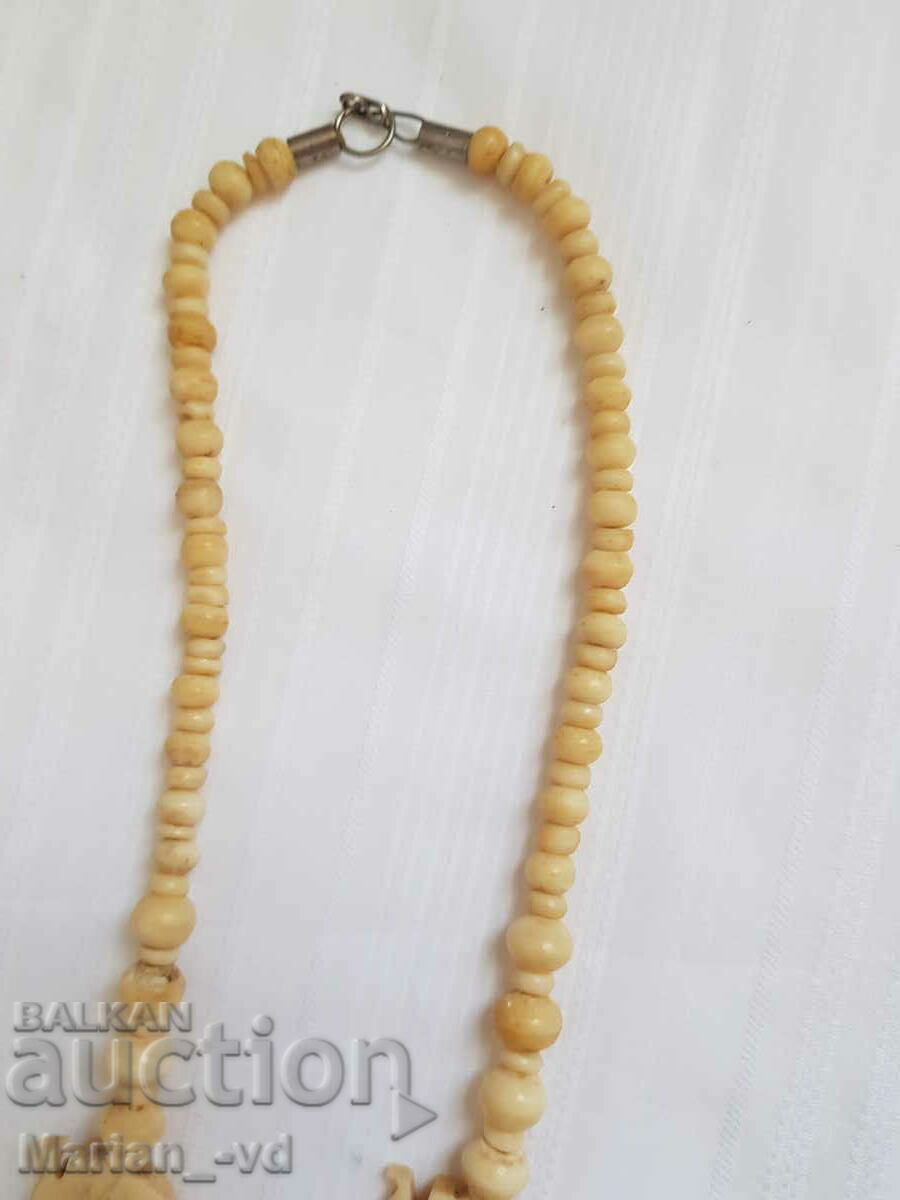 Delivery of Necklace bone, elephant, pendant, figurine