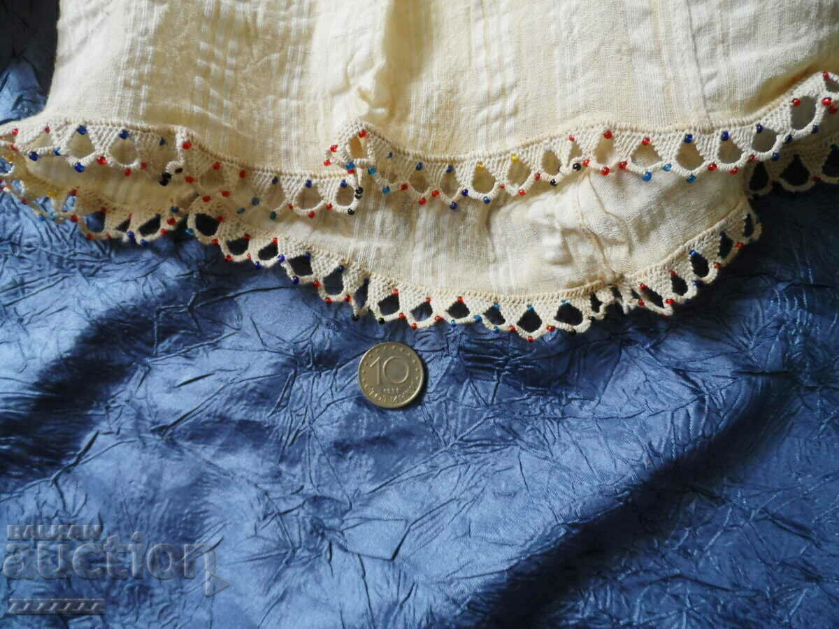 Delivery of Kenarana shirt with kenna and beads