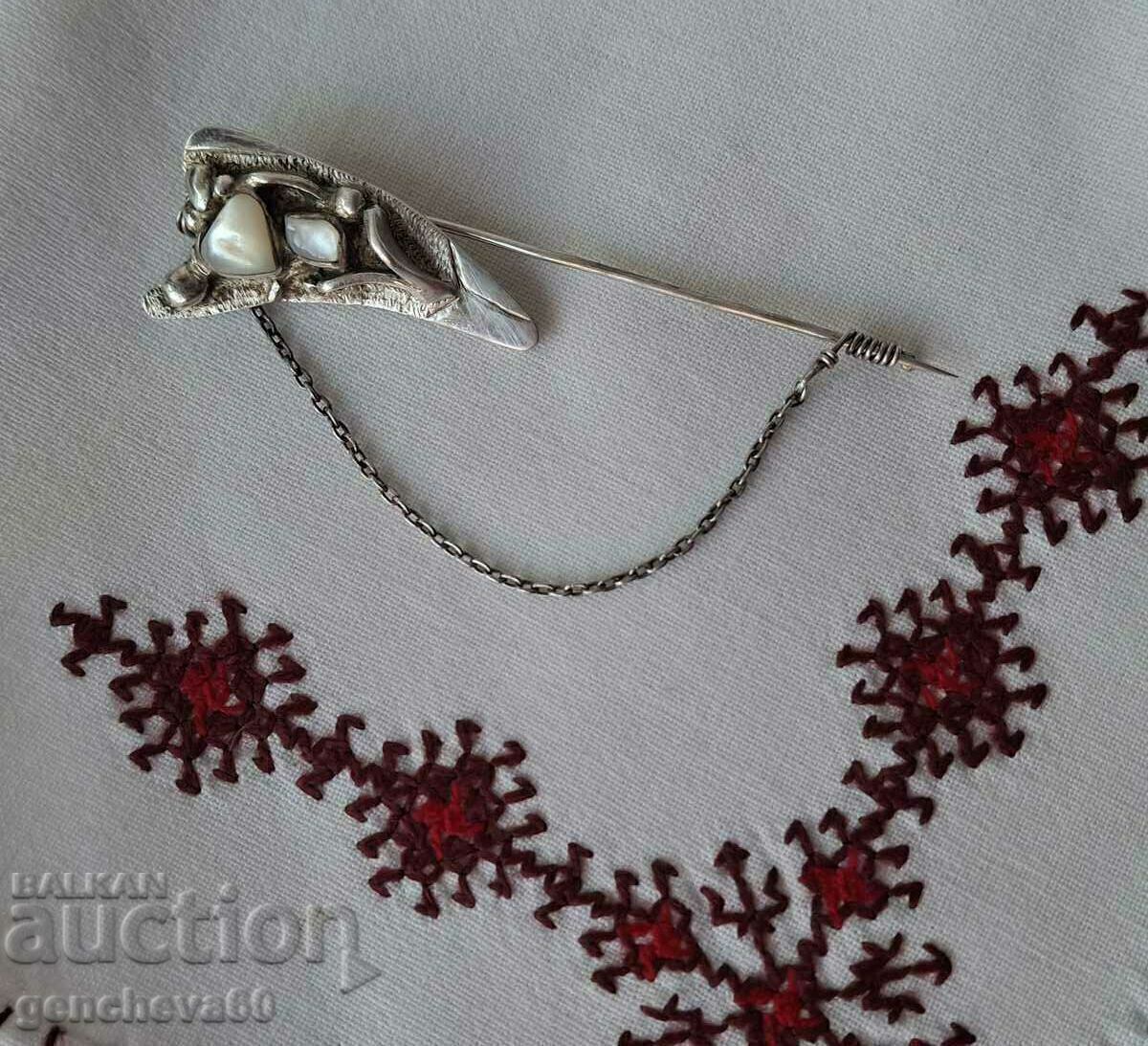 Delivery of Designer silver pin Delivery of Designer silver pin