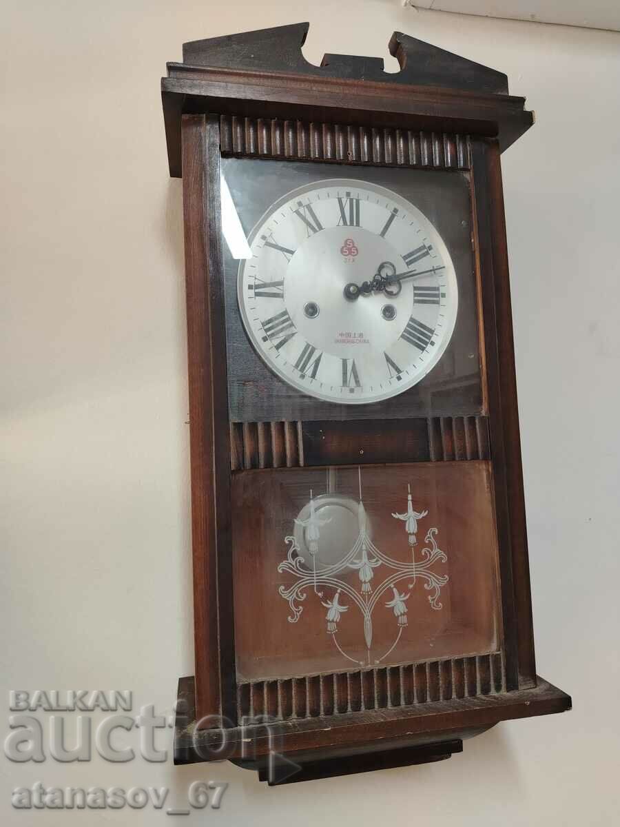 Wooden old wall clock