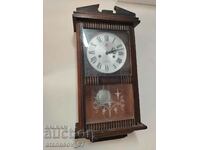 Wooden old wall clock