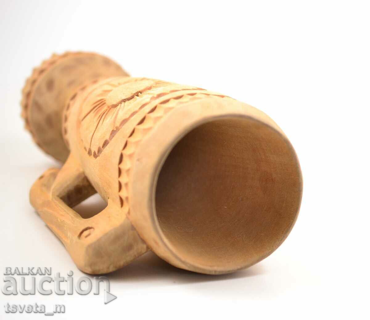 Auction  Tall wooden mug, carved mug
