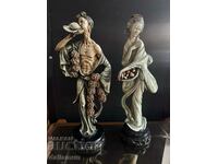 A pair of antique figurines for decor