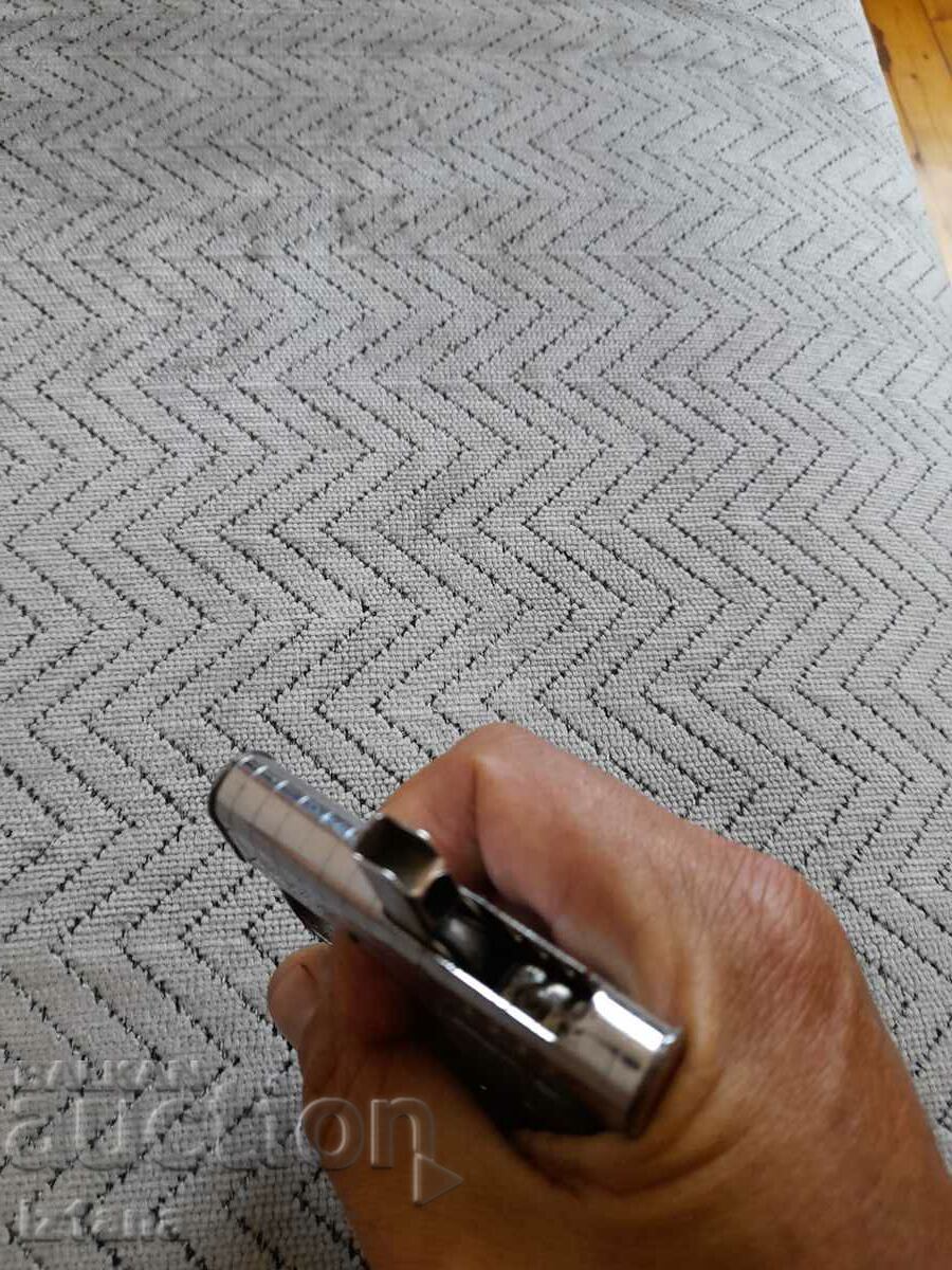 Delivery of Old pistol lighter Delivery of Old pistol lighter